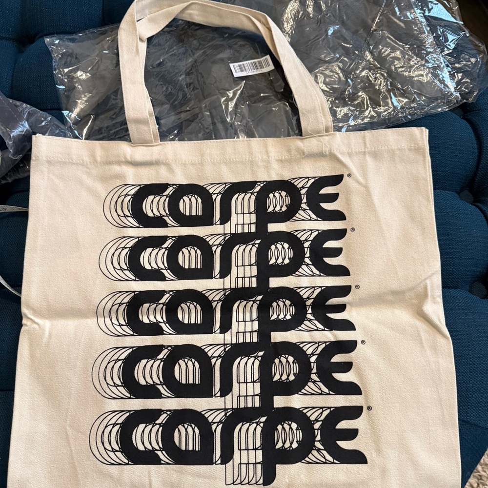 Carie-Graphic Tote Bag with Bold Text Design